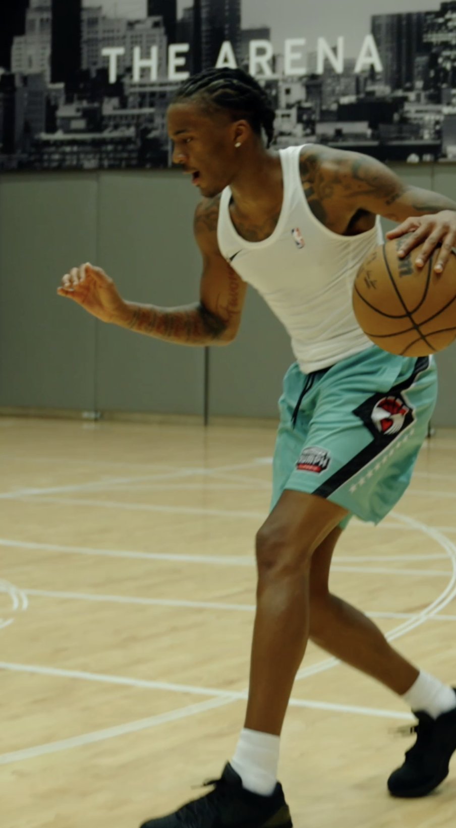 A player driving with the ball at The Arena