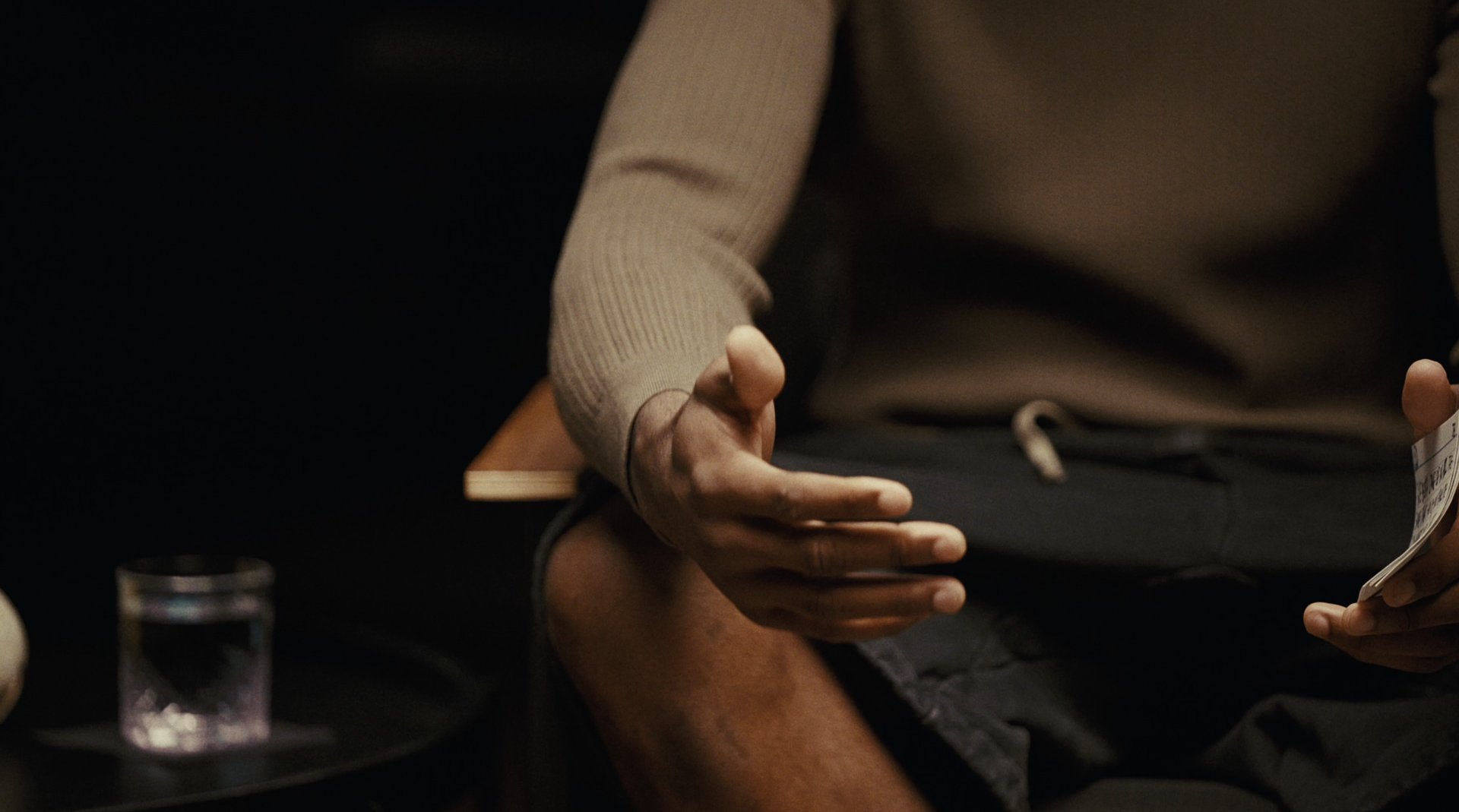 Close-up of hands gesturing mid-conversation