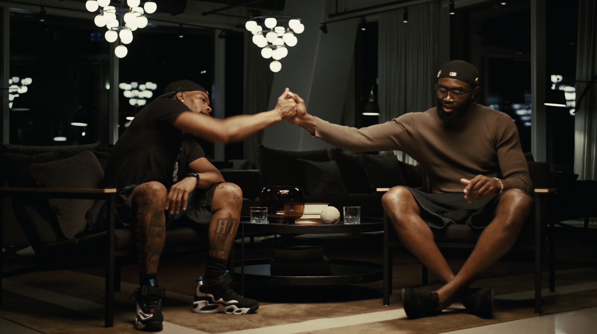 Lil Baby and Jaylen Brown shaking hands