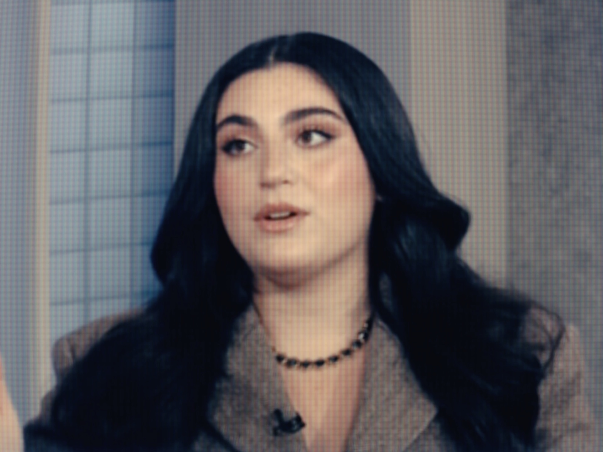 Interview subject on screen, mid-conversation
